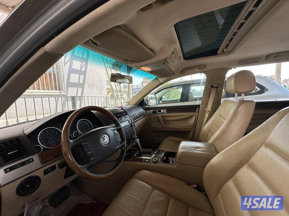 فولكس طوارق صبغ الوكاله موديل 2009 ماشي 192 الف فقط كامل المواصفات7