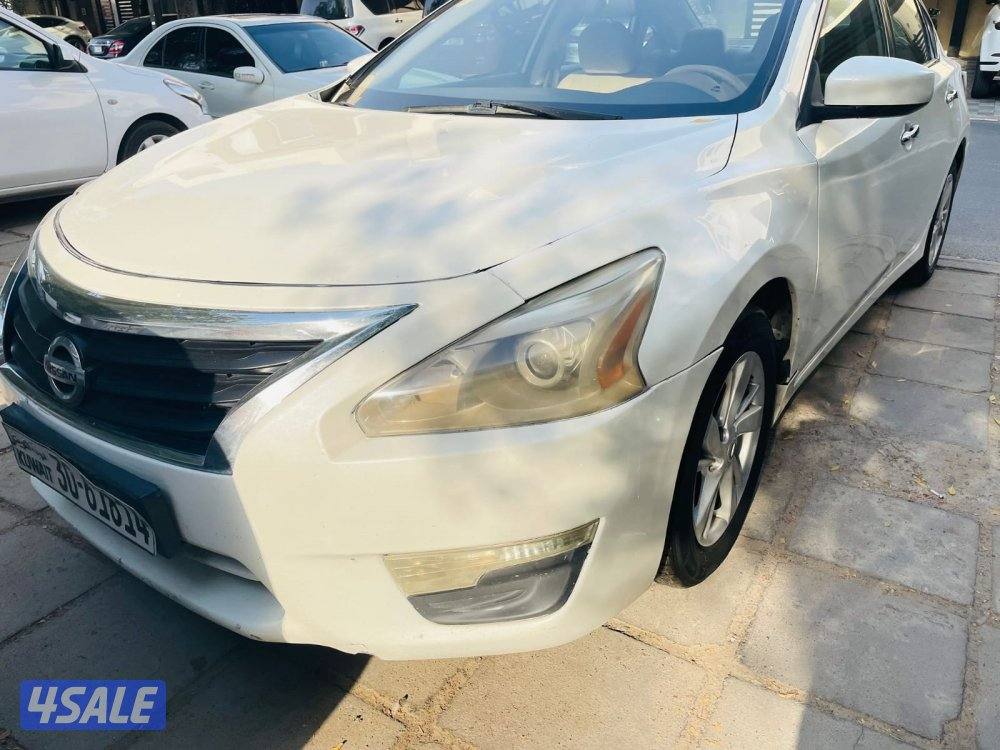 نيسان التيما موديل 2015 للون ابيض صدفي 2.5 مكينة 4 سلندر1
