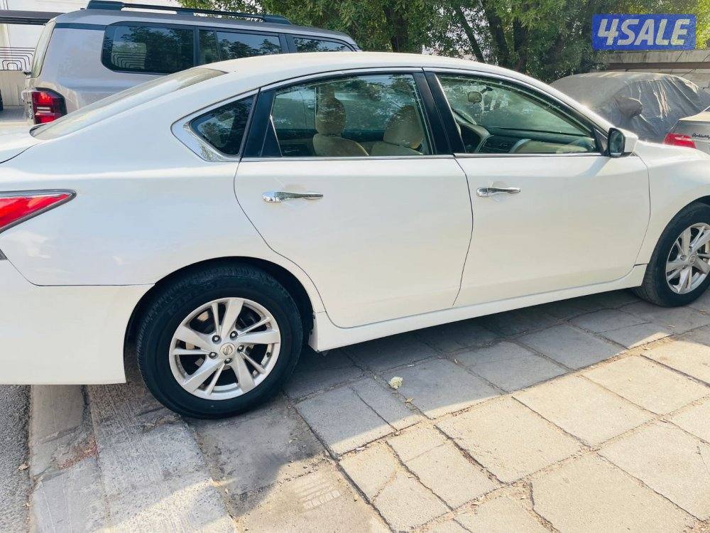 نيسان التيما موديل 2015 للون ابيض صدفي 2.5 مكينة 4 سلندر4