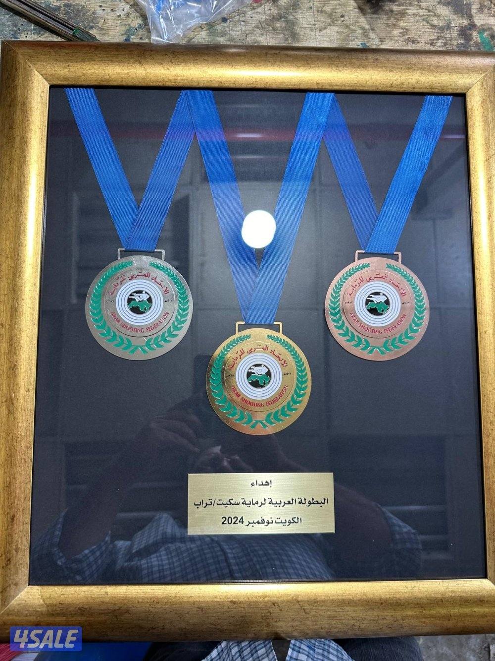 تصميم وتوريد أرقى الميداليات والأوسمة والدروع12