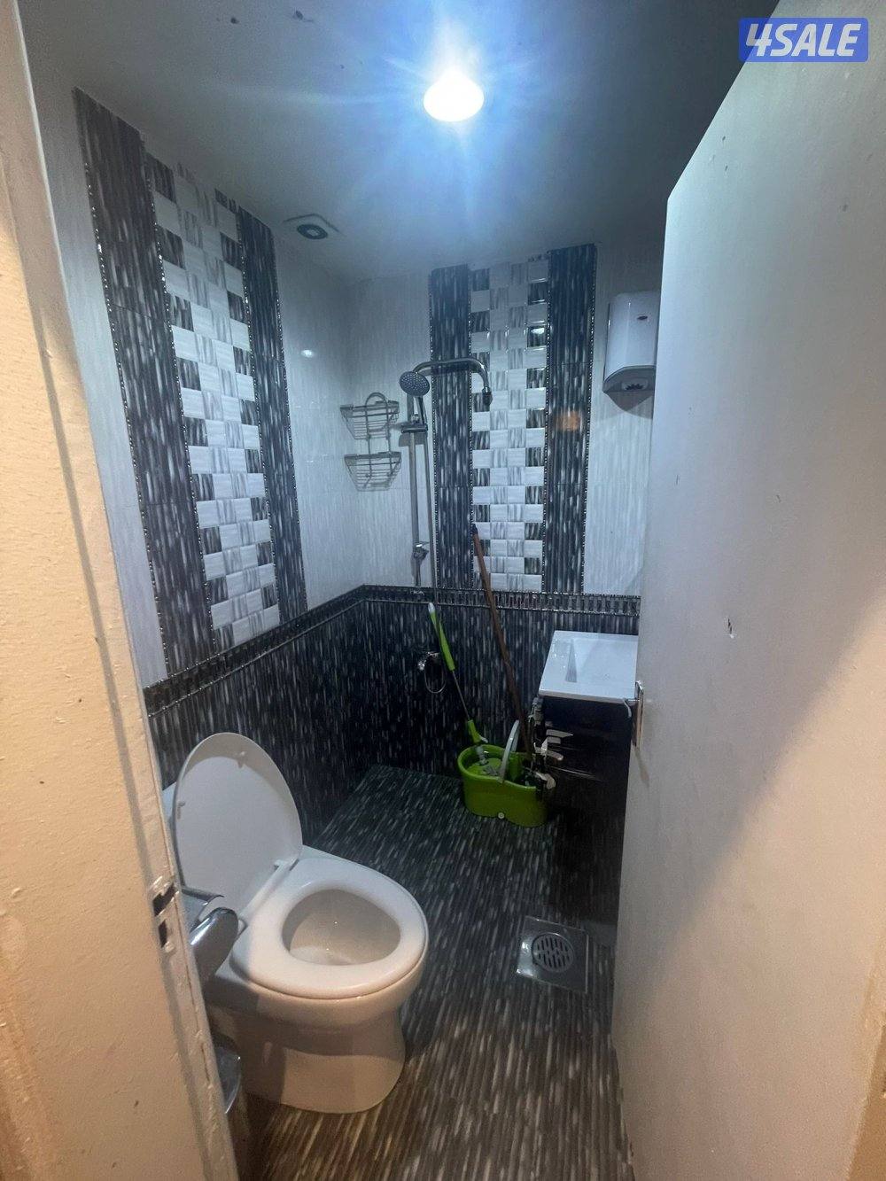 شقةغرفةصالةتشطيب جديد حمام مطبخ كويتين فقط تكيف سنترال مصافط متوفرة12