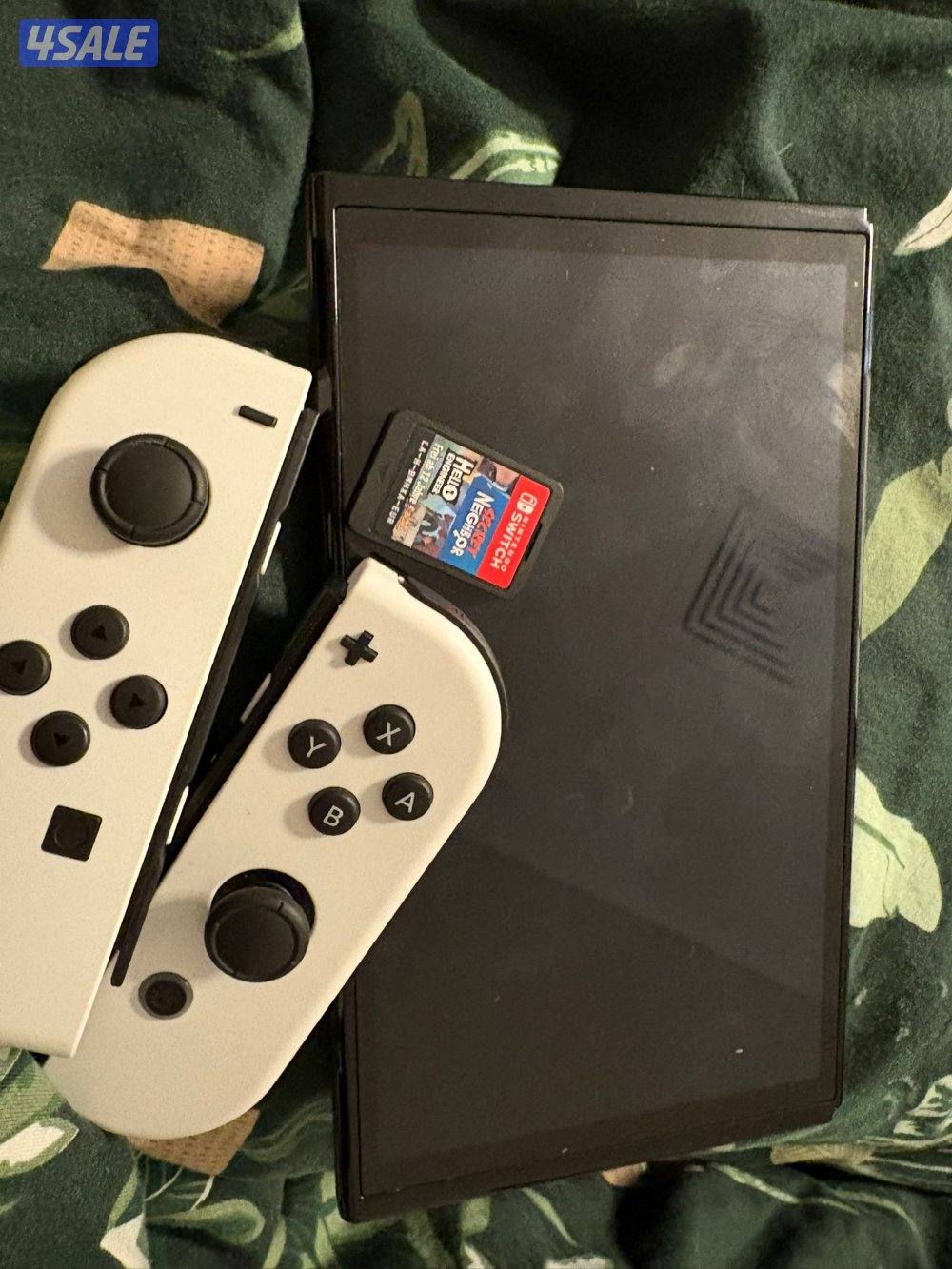 نايتندو سويتش نظيفة للبيع معها العاب1