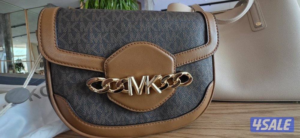للبيع Michael Kors Hally Bag أصلية 100٪
جديدة بالكامل لون بني سيغنتشر0
