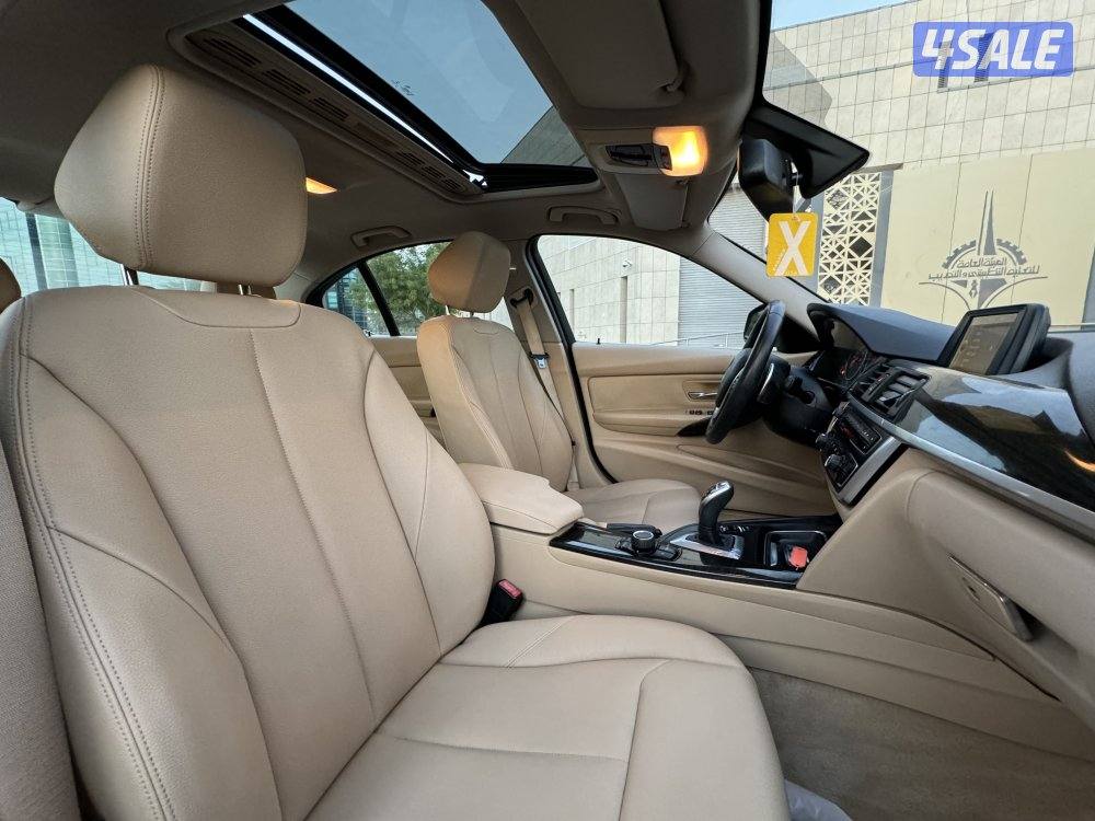 BMW 320 i موديل 2014 بحاله ممتازه شرط الفحص9