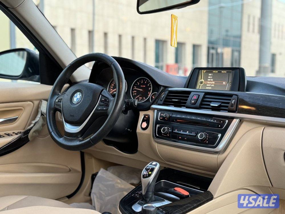 BMW 320 i موديل 2014 بحاله ممتازه شرط الفحص10