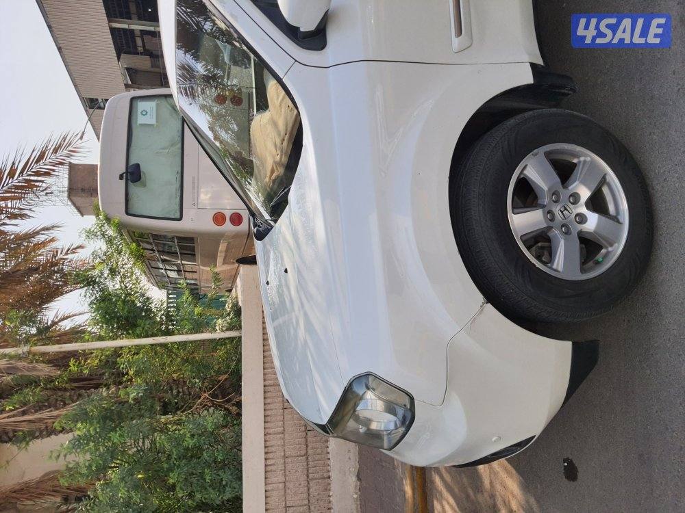 بايلوت بحالة جيده موديل 2013 لون ابيض كاميرا خلفيه سنسوارات5