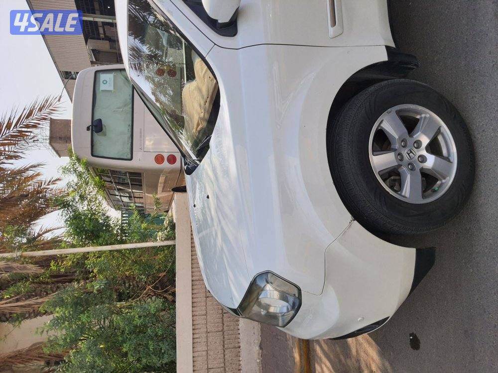 بايلوت بحالة جيده موديل 2013 لون ابيض كاميرا خلفيه سنسوارات10