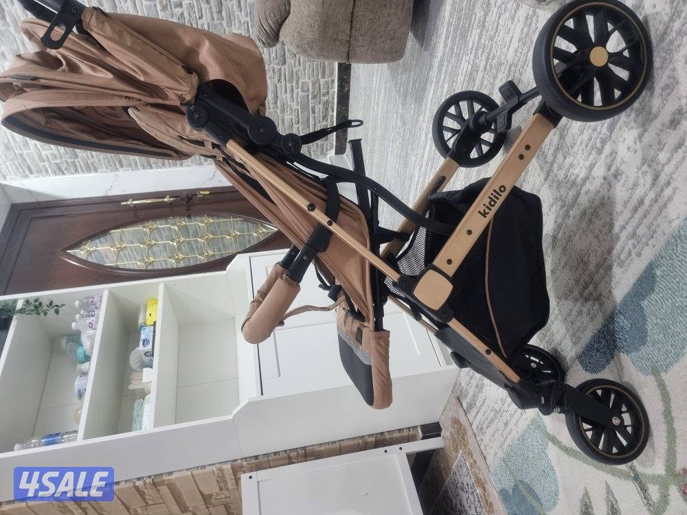 عربة أطفال kidilo أصلية، سعرها ٢٥ دينارًا. استخدمت لمدة شهر واحد فقط.0