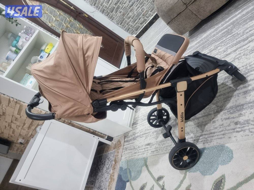 عربة أطفال kidilo أصلية، سعرها ٢٥ دينارًا. استخدمت لمدة شهر واحد فقط.3
