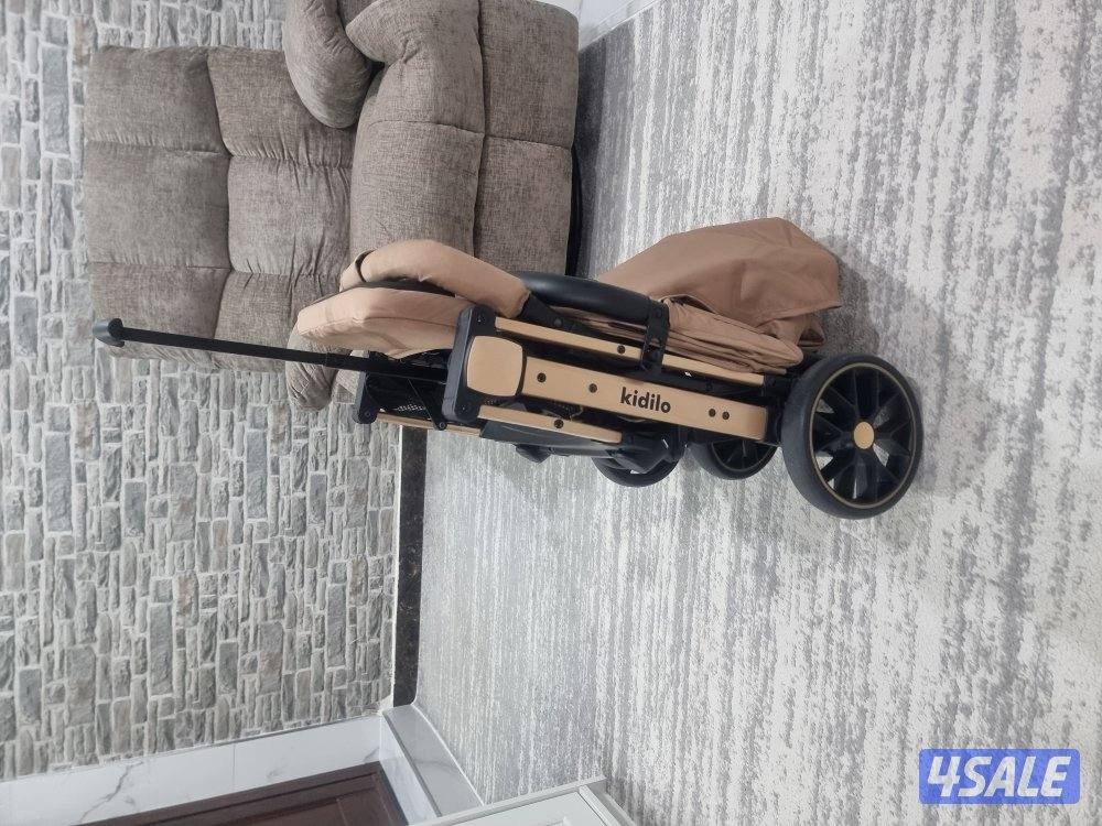 عربة أطفال kidilo أصلية، سعرها ٢٥ دينارًا. استخدمت لمدة شهر واحد فقط.4