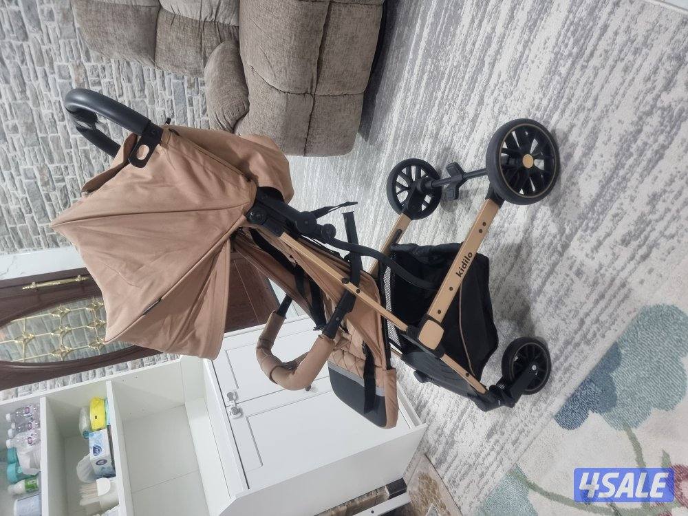 عربة أطفال kidilo أصلية، سعرها ٢٥ دينارًا. استخدمت لمدة شهر واحد فقط.7