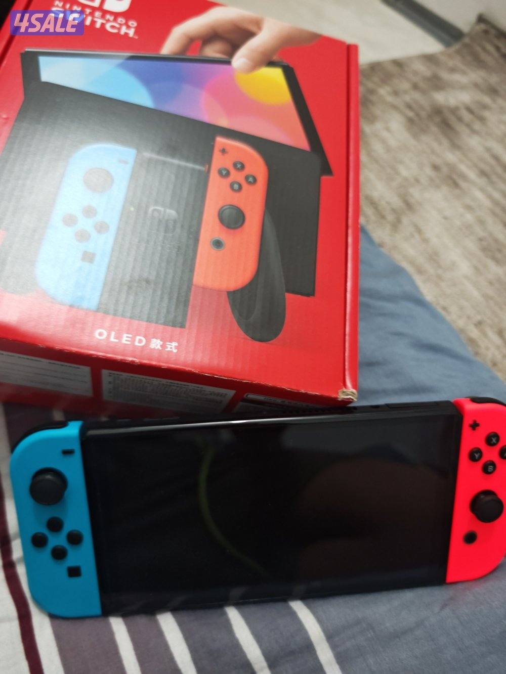 نيتيندو سويتش oled احمر ازرق جديد استعمال يومين0