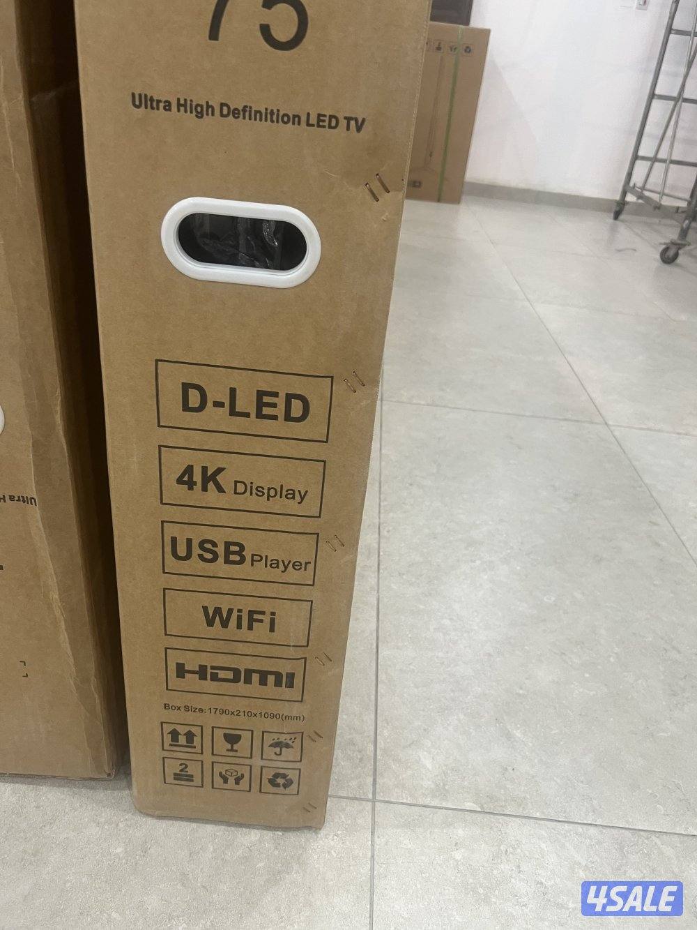 للبيع تلفزيون ٧٥ بوصه جديد بالكرتون0