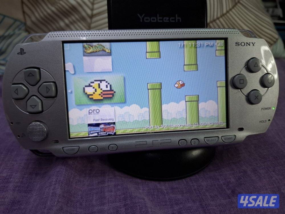 PSP SONY P1000 MODEL GREY COLOR 8GB SONY SD CARD WITH 50 AMAZING GAMES7