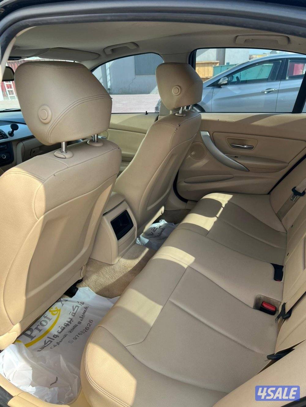 بي ام دبليو 320i اسود من داخل بيج1