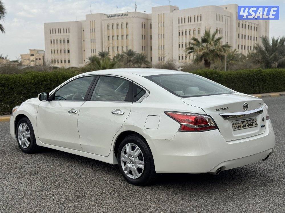 نيسان التيما موديل 2014 بحاله ممتازه شرط الفحص5