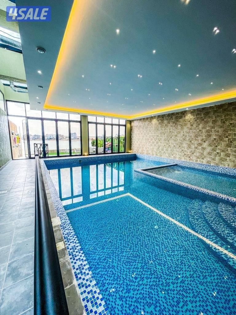 للبيع شاليه دورين المرحله الثالثه يطل على الخور صف اول1