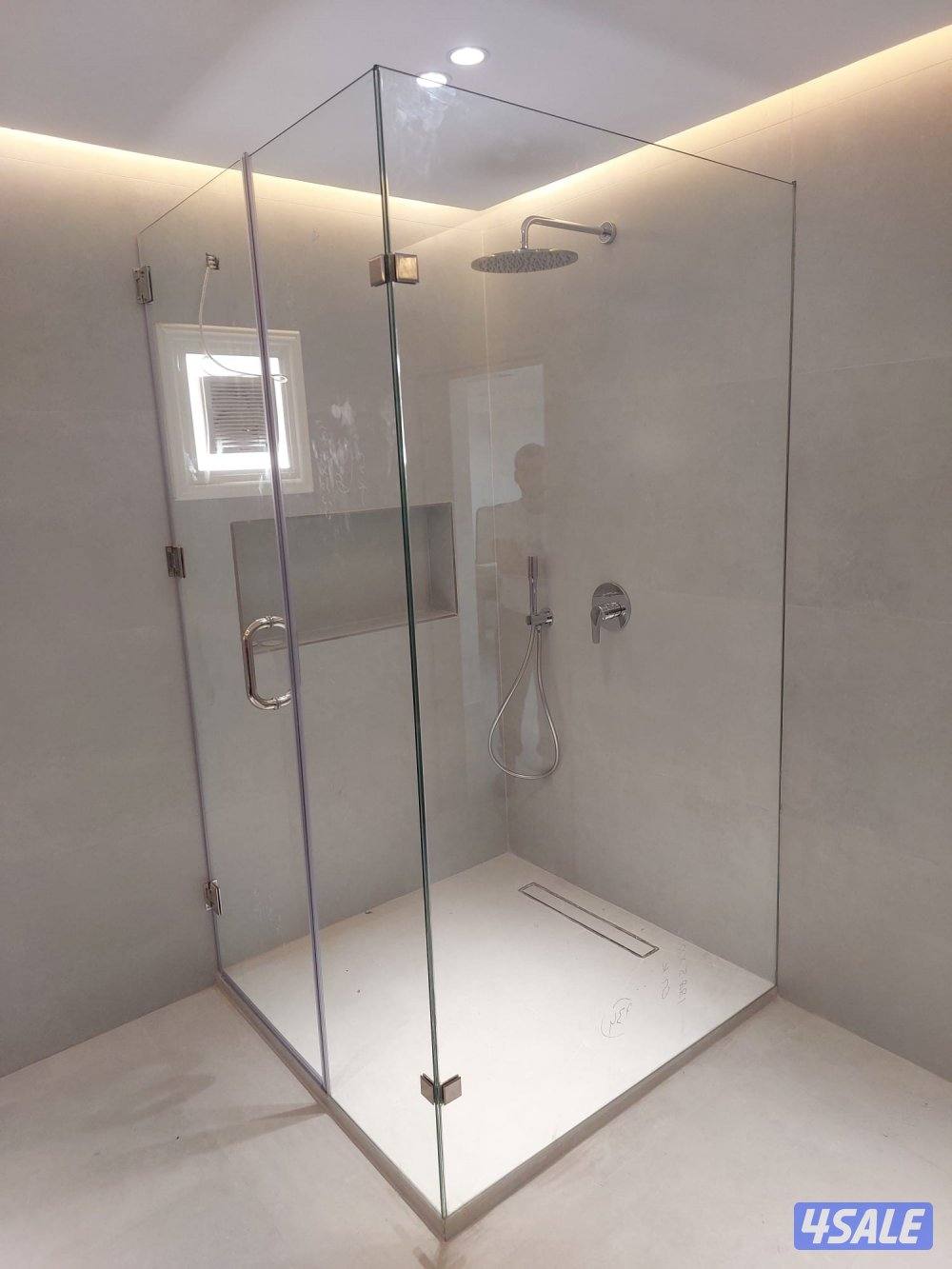 فني زجاج ومرايا وطاولات طعام وشاور بكس وتركيب جميع انواع الزجاج0