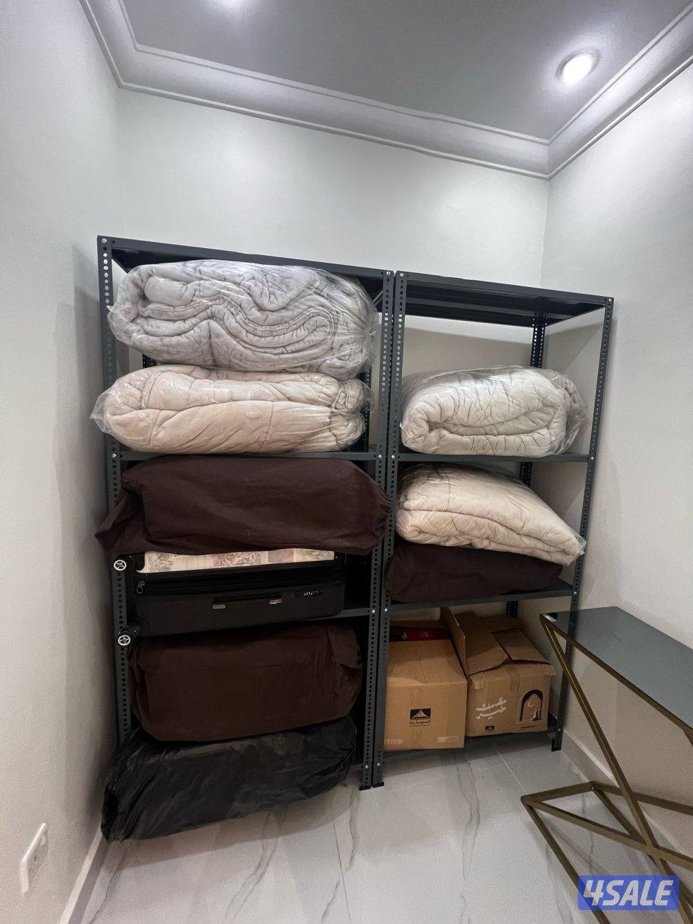 ارفف تخزين مع التوصيل والتركيب3