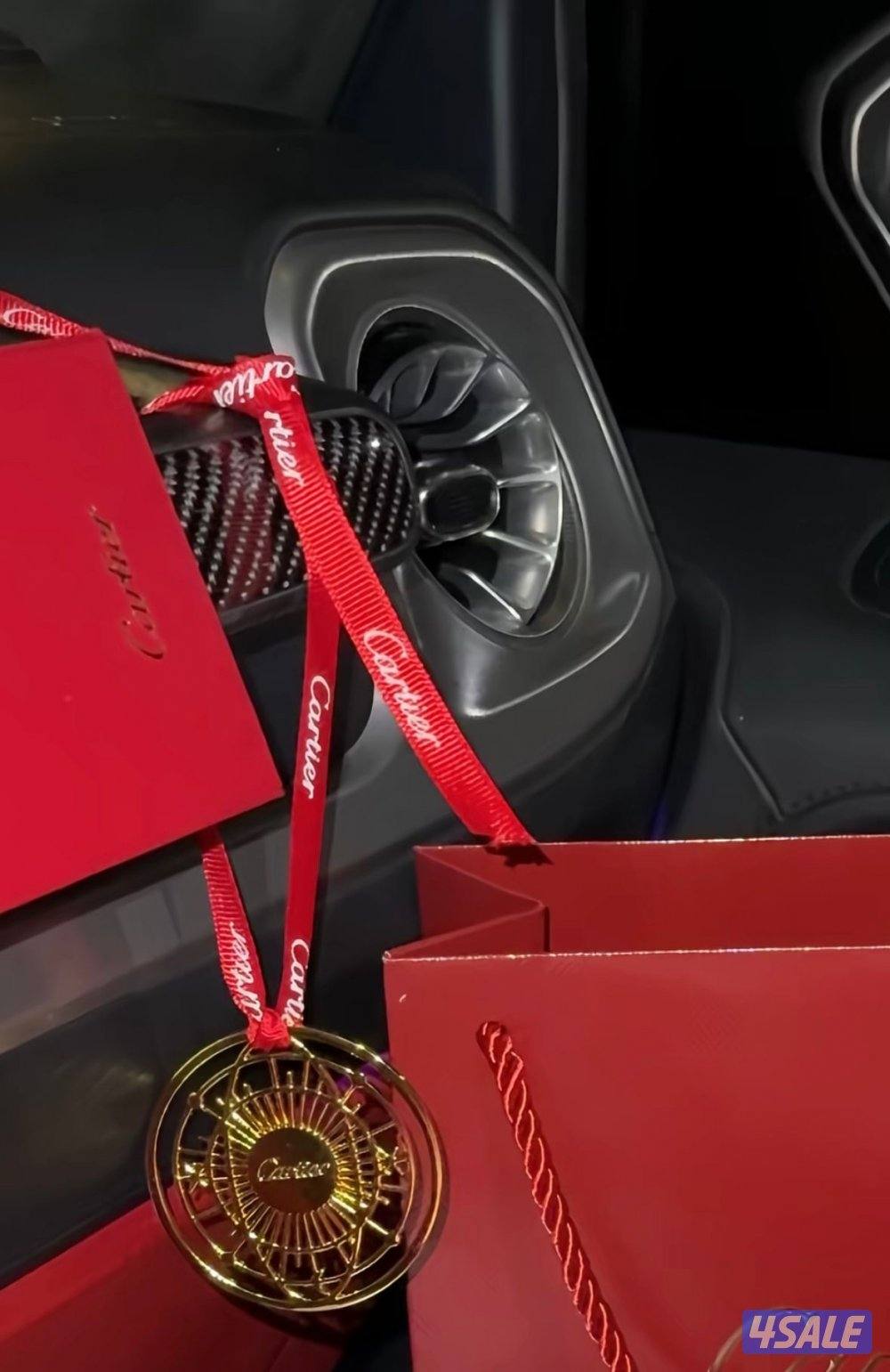 تعليقاات كارتيير وديور للسيارة6