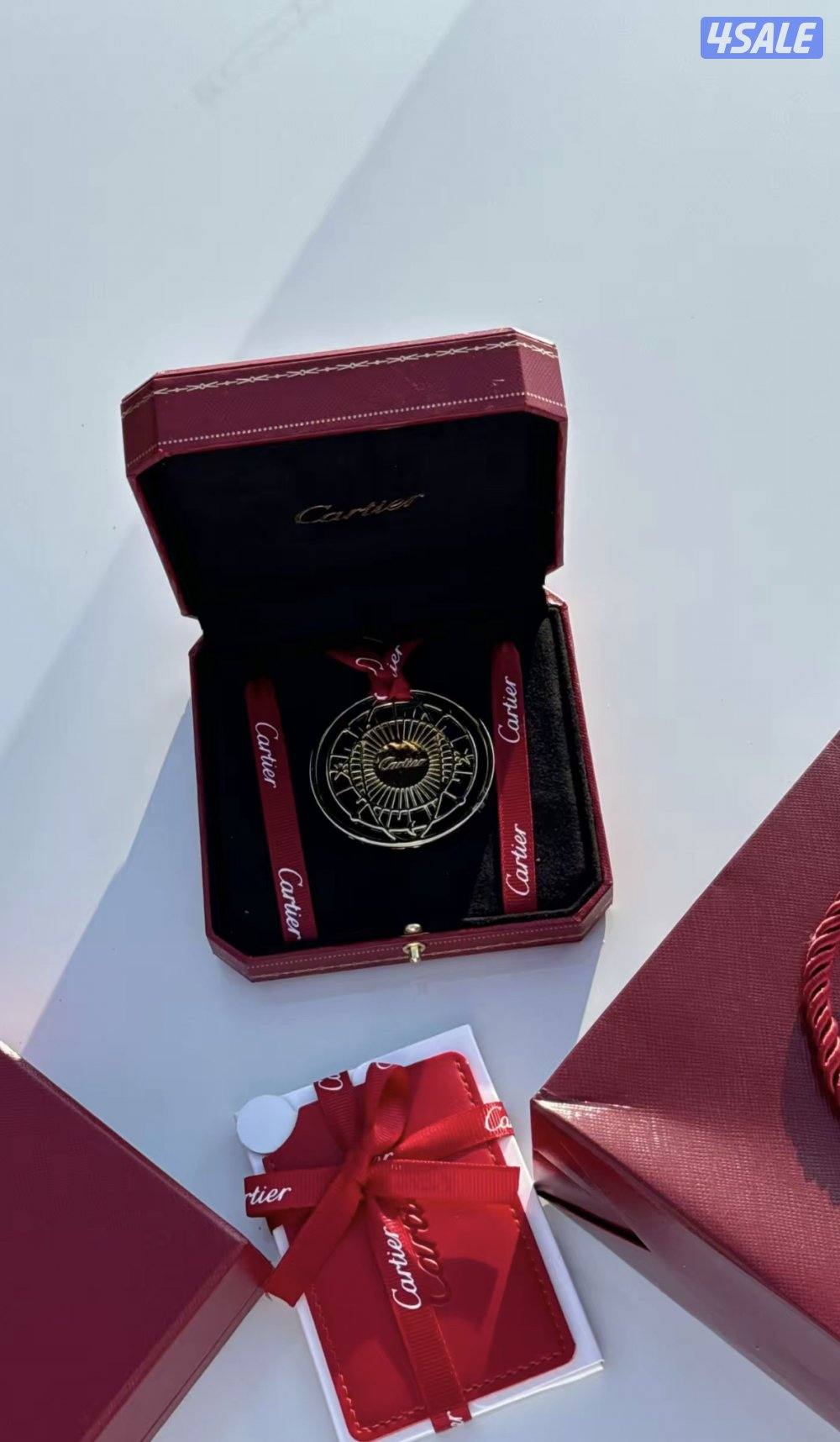 تعليقاات كارتيير وديور للسيارة10