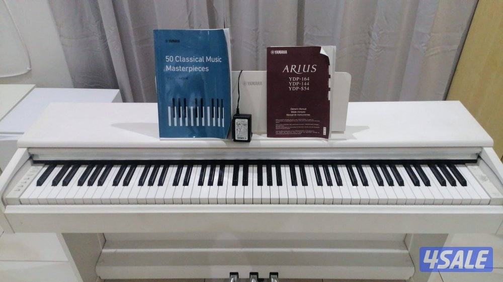للبيع بيانو YAMAHA YDP-144 🎹4