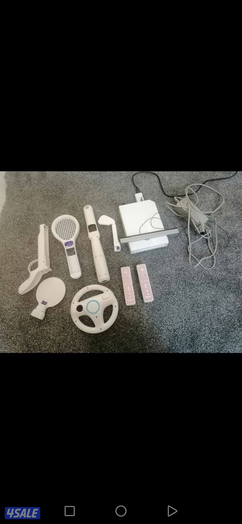 للبيع wiiنضيفه جدا مع جميع ملحقاتها ويوجد بها 100 لعبه الجهاز شبه جديد0