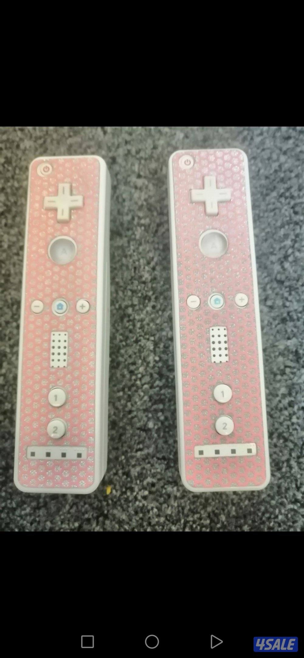 للبيع wiiنضيفه جدا مع جميع ملحقاتها ويوجد بها 100 لعبه الجهاز شبه جديد1