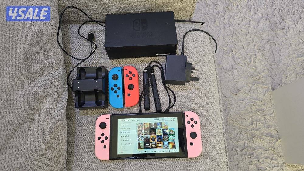 نيتندو سويتش مطور مع ٥٠ لعبه و ٤ يدات وبرنامج تحميل الالعاب مجانا0