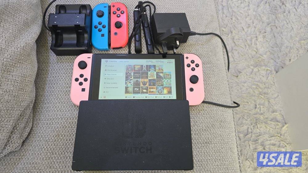 نيتندو سويتش مطور مع ٥٠ لعبه و ٤ يدات وبرنامج تحميل الالعاب مجانا1