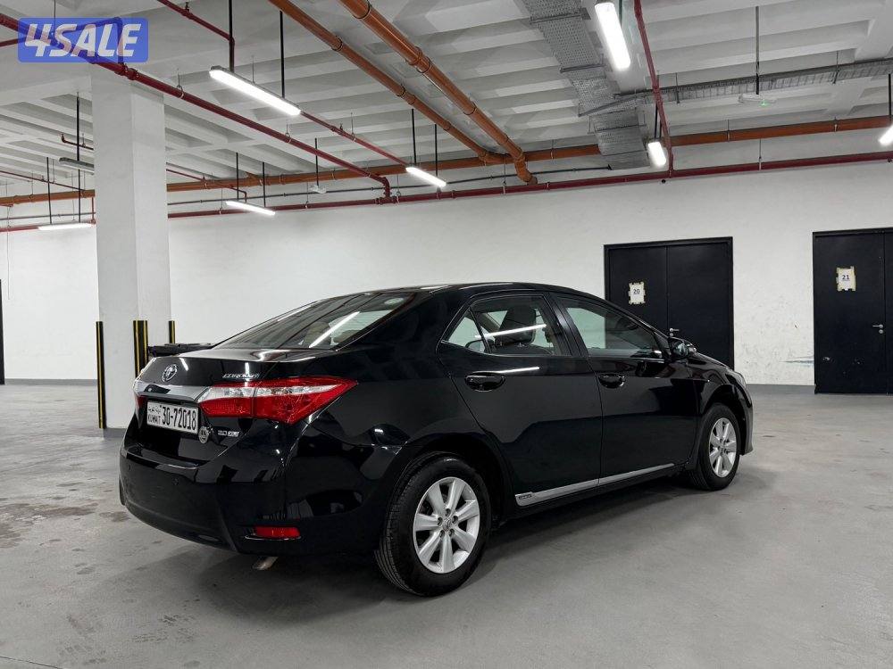 كورلا صبغ الوكاله موديل 2015 كامل المواصفات عداد قليل بحالة الوكاله2