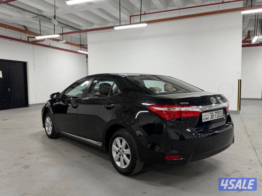 كورلا صبغ الوكاله موديل 2015 كامل المواصفات عداد قليل بحالة الوكاله9