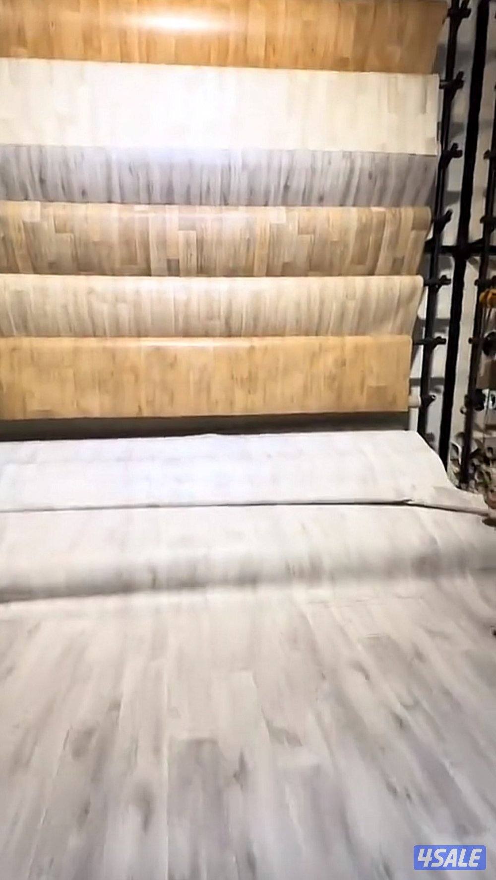 يوجد لدينا جميع انواع السجاد والباركيه رول0