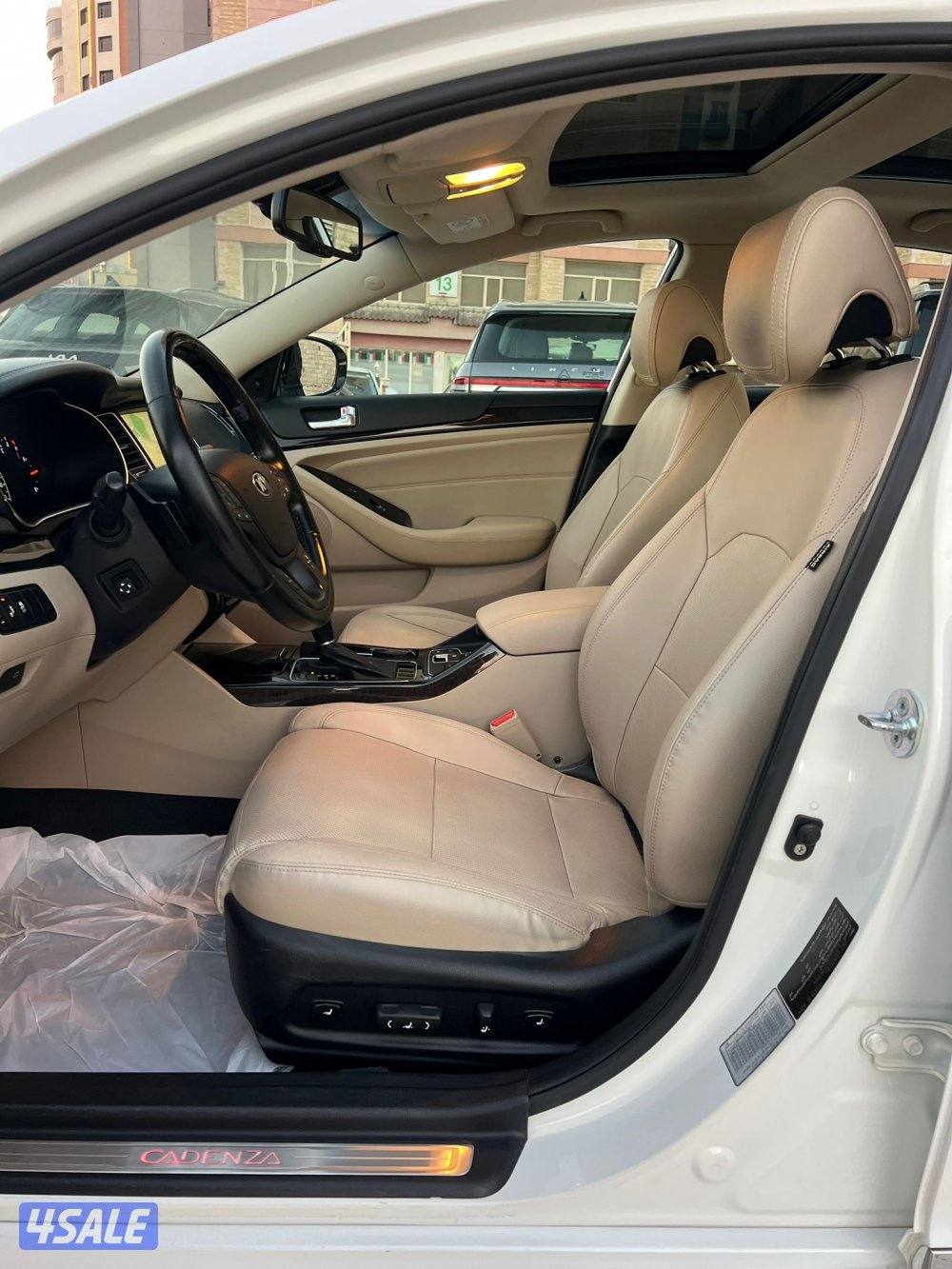 كيا 2014 كادينزا بحالة الوكاله ماشي 80 الف صبغ الوكاله شرط الفحص11