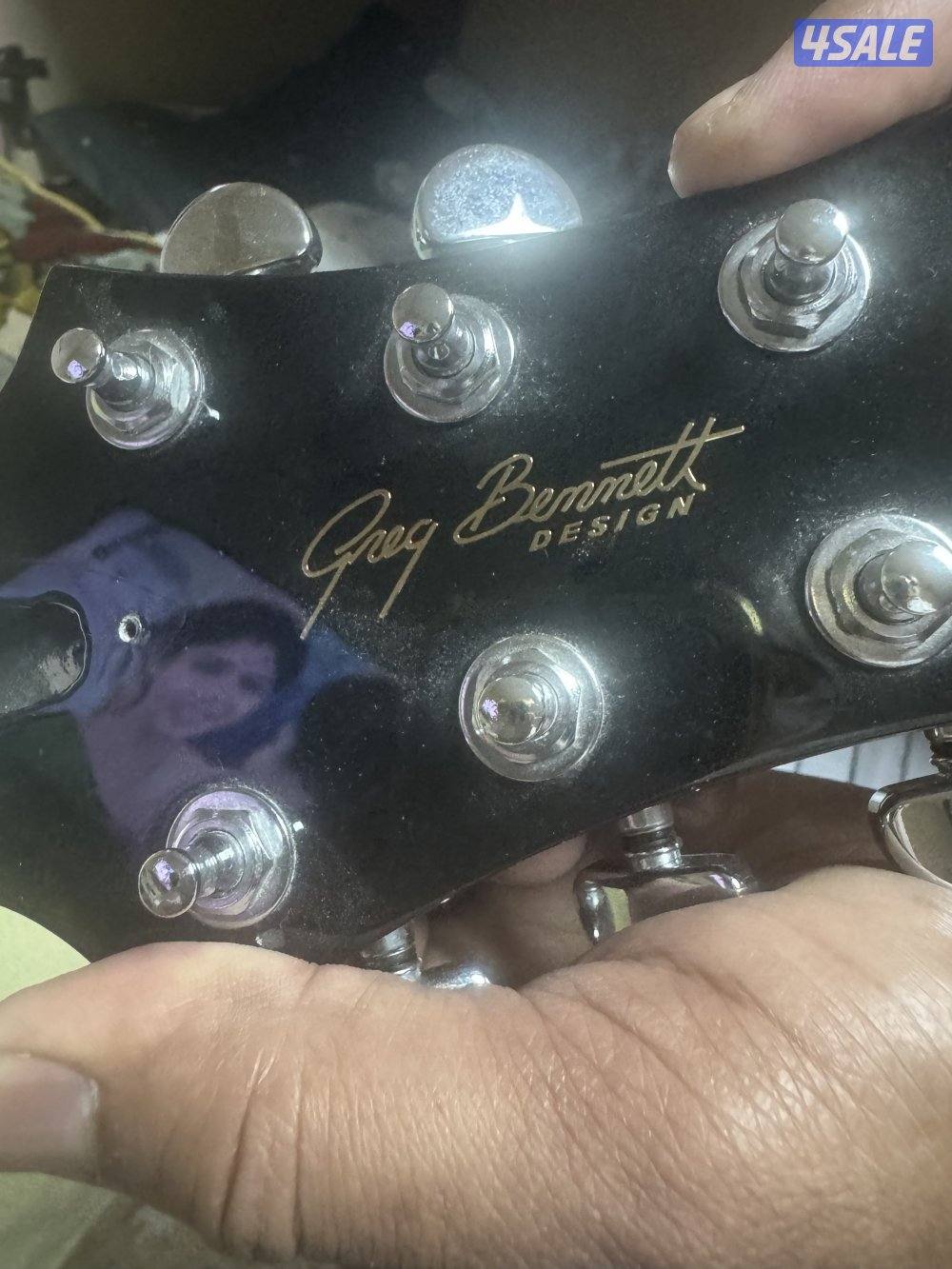 غيتارنوع كهرباء لونه اسود بحاله جيده مشتاره ب1301