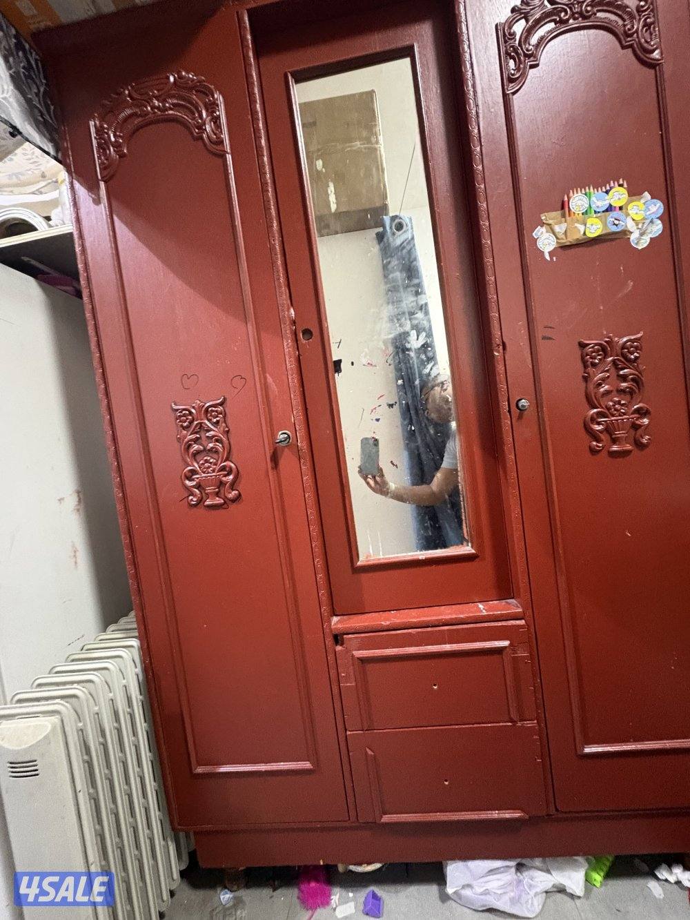 Three door cupboard on sale0