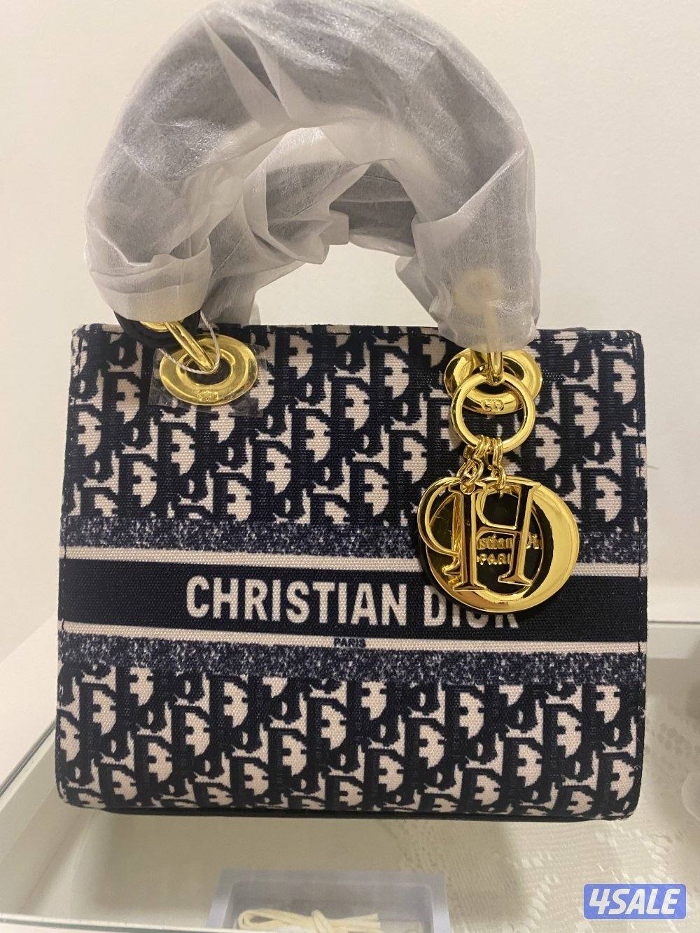 جزدان christan dior درجه اولى master التنين مع بعض ٢٥0