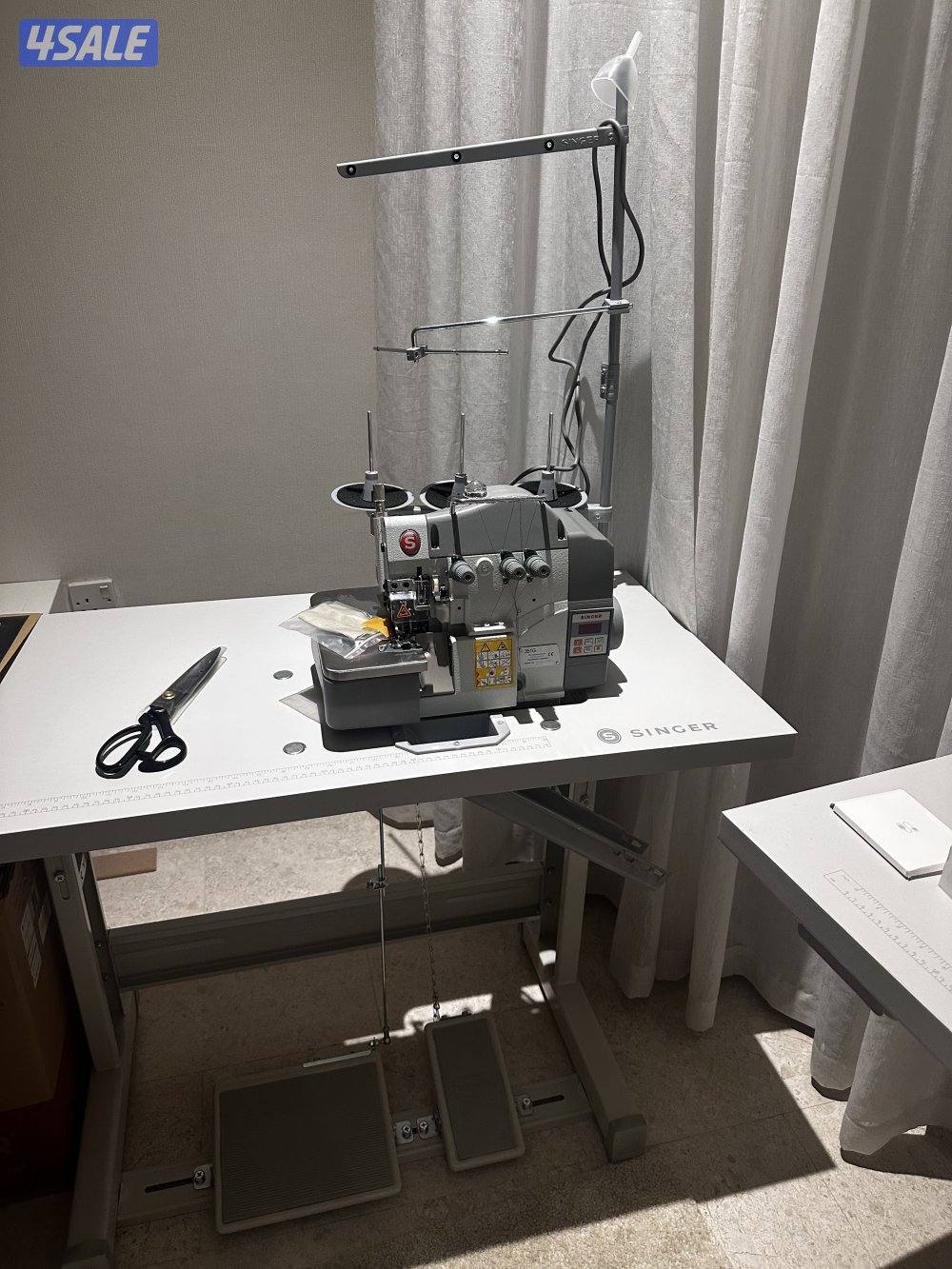 للبيع مكينة خياطة + مكينة تنظيف جديدة لم تستخدم0