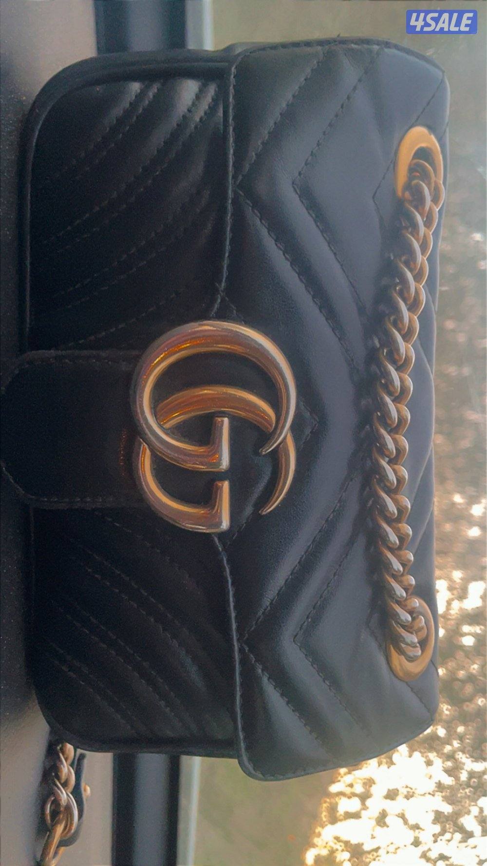 جنطه قوتجي اصلية انا شاريها من البوتيك 490 ابي فيها250 اذا مو اصلية ف0