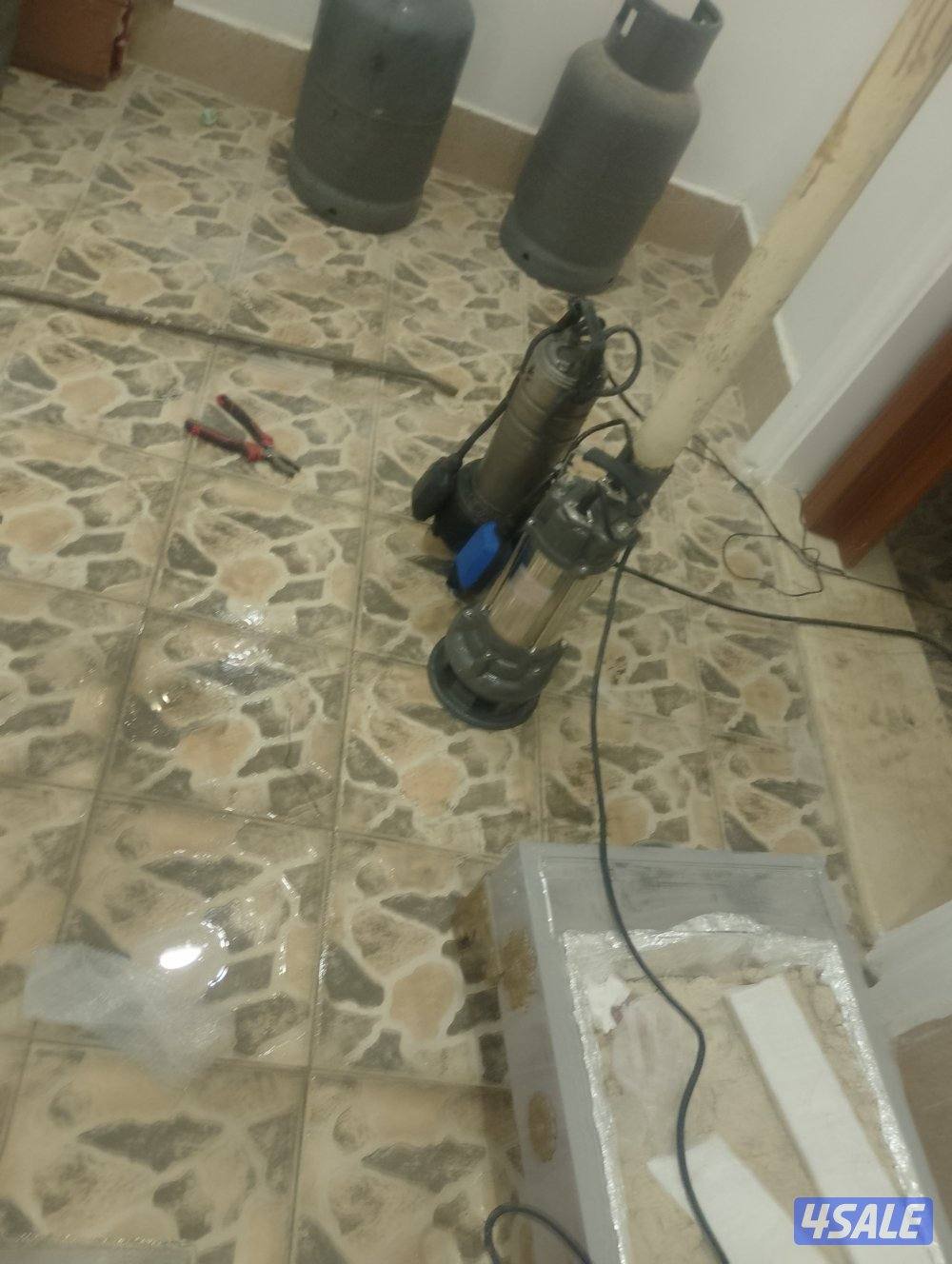 فني صحي تركيب وتصليح مضخات السرداب ومضخات المياه1