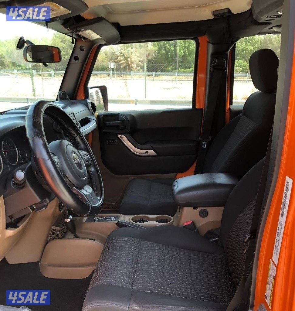 A beautiful and unique 2012 Jeep Wrangler Sahara Limited  I142000 KM1