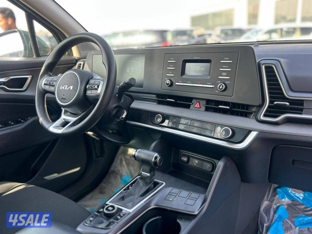 كيا سبورتاج موديل 2023  ماشى 63.000 k.m وارد المطوع .7