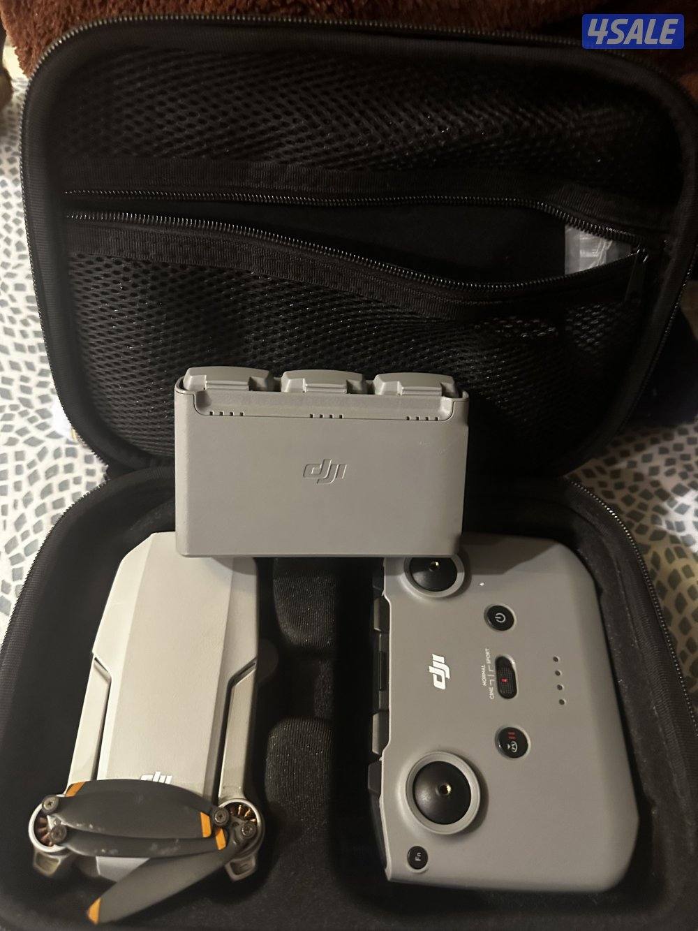 Dji mini 2 and bag and power bang with three batteries and controller0