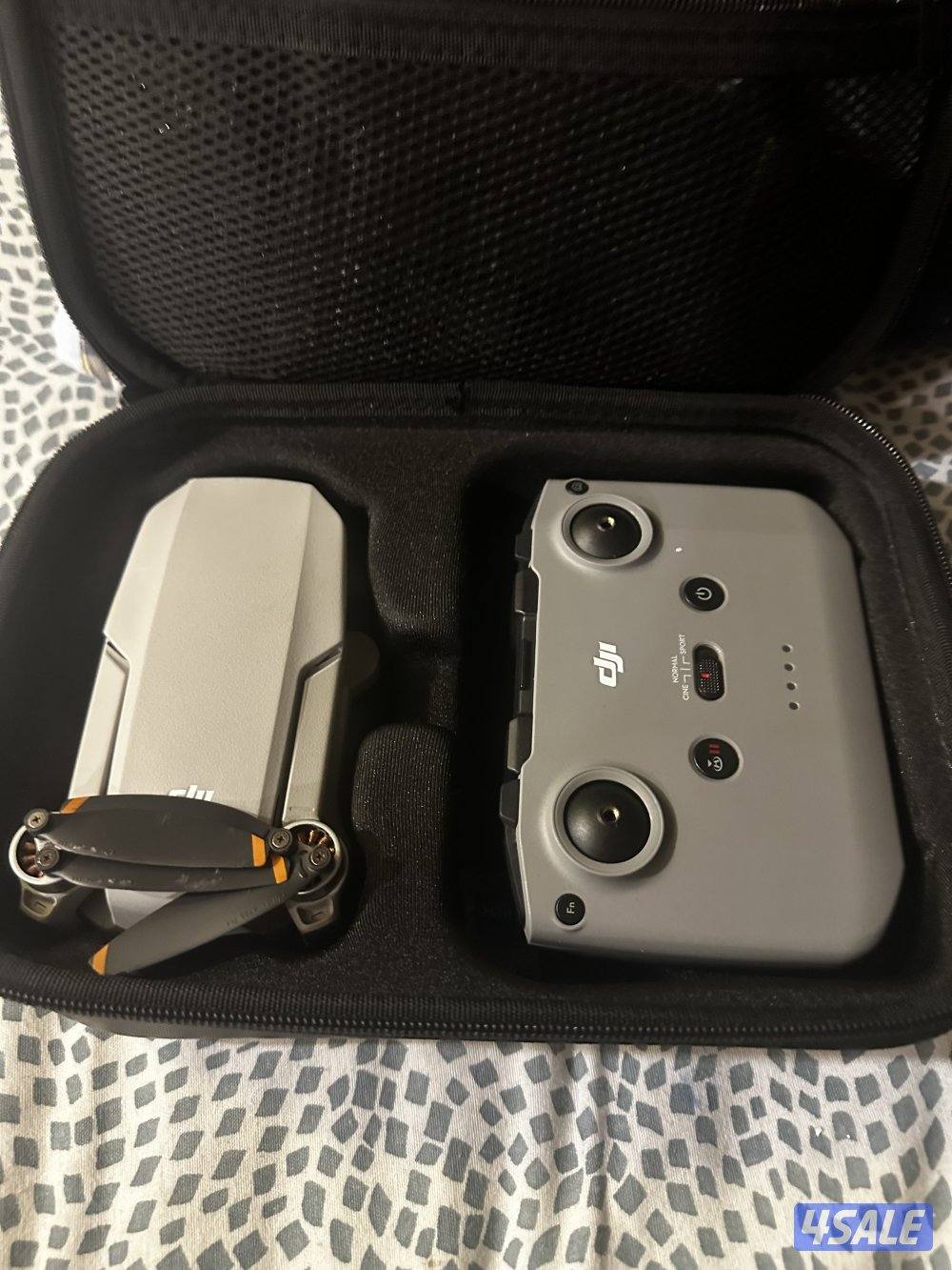 Dji mini 2 and bag and power bang with three batteries and controller1
