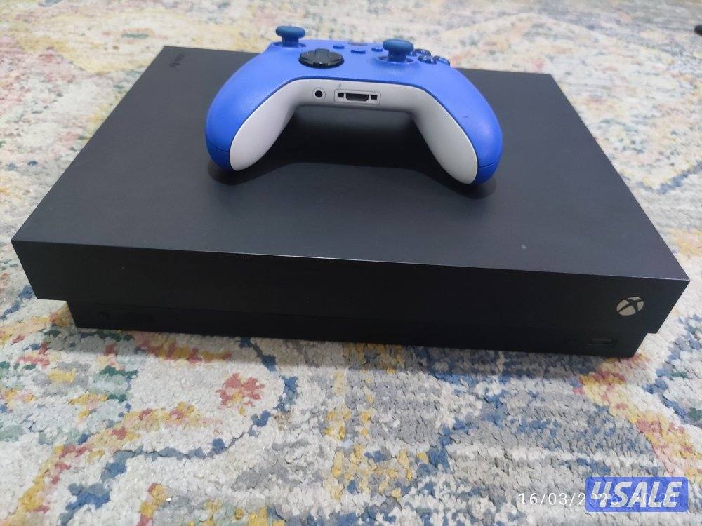 اكس بوكس ون اكس 1 تيرا مع يدة0