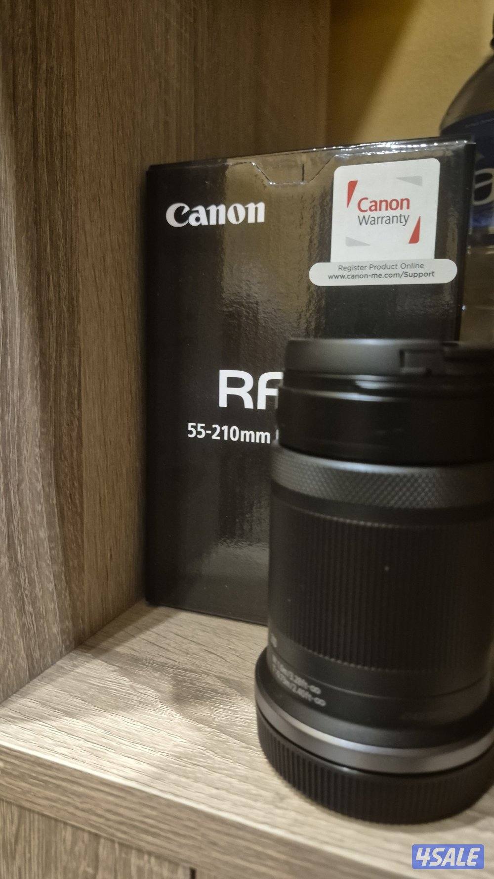 عدسه من كانون 55-210 rf استعمال خفيييف مافيها ولا خدش السعر قابل للمسا0
