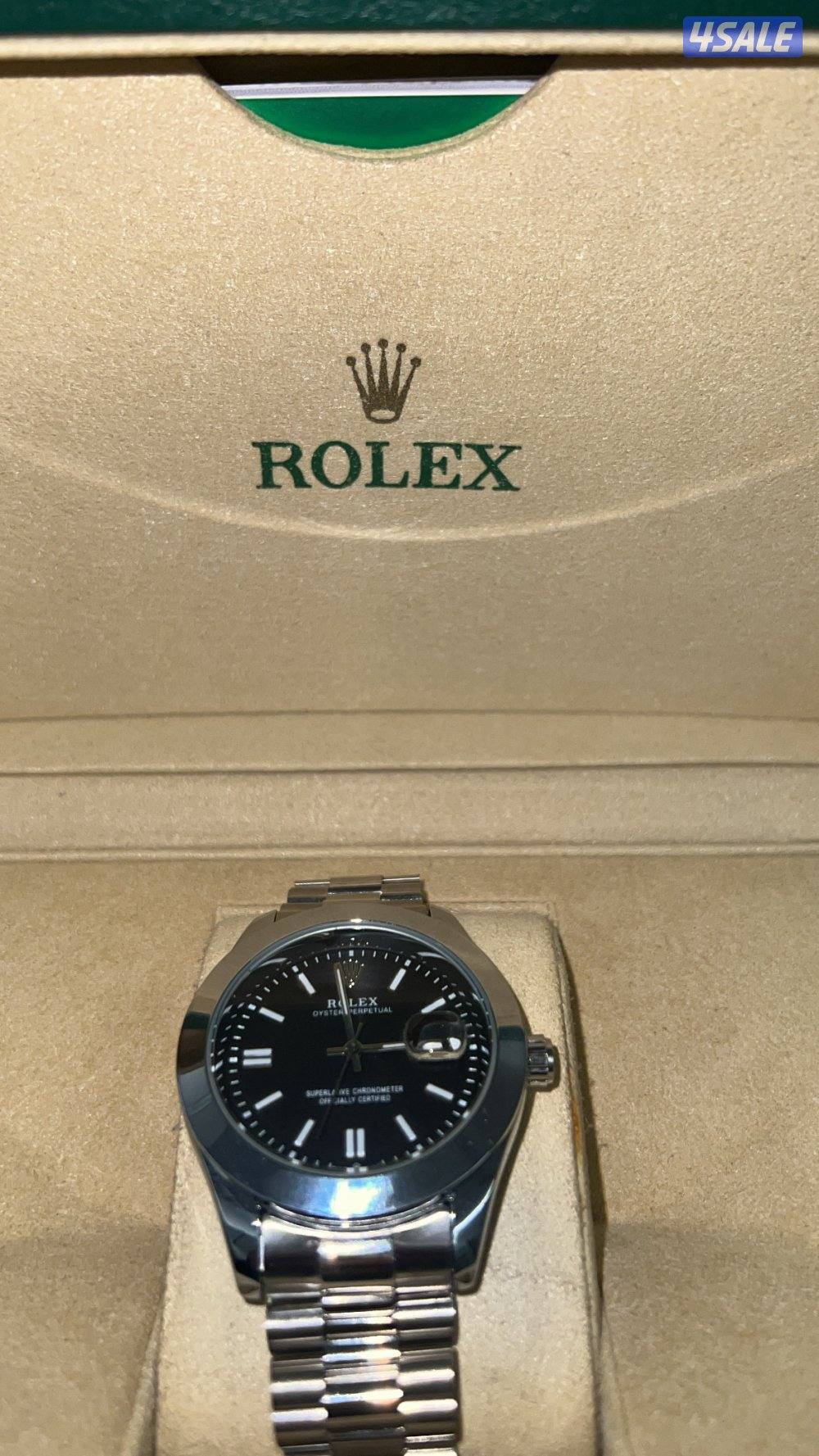 ساعة رولكس شبه تقليد و الكرتون جاني هديه في الدفتر حق الساعه و الاصدار0