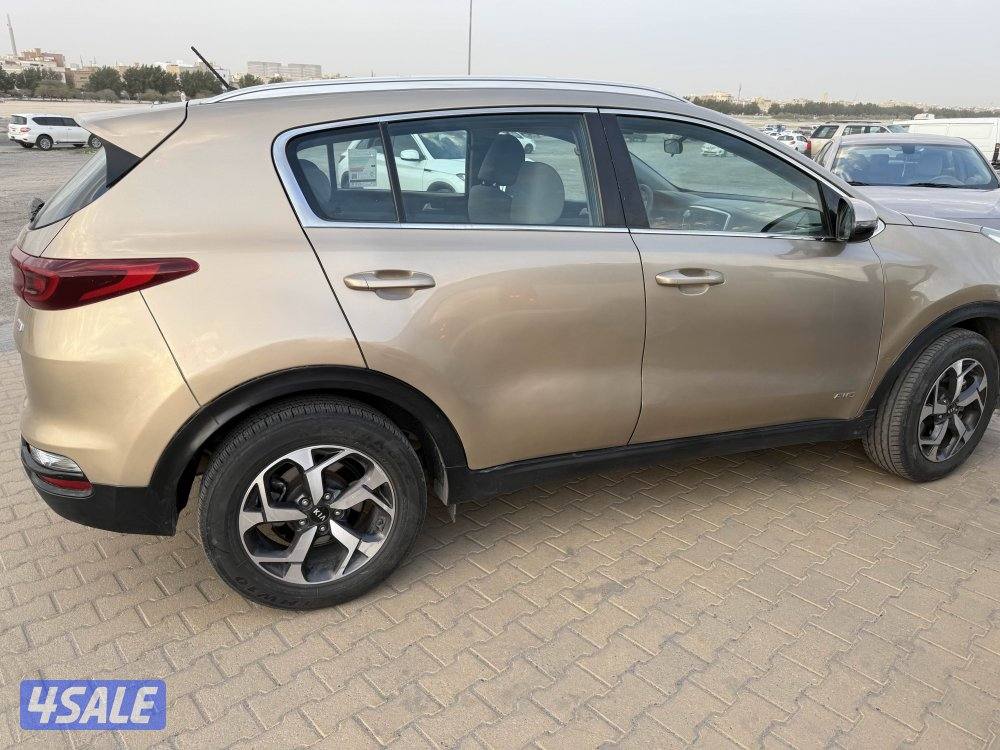 كيا سبورتاج للبيع ذهبي فحص مكينه قير شاصي ماشي 255  دبل قير0