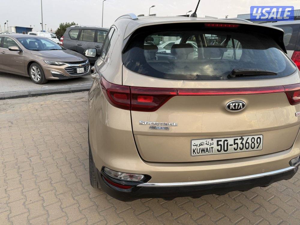 كيا سبورتاج للبيع ذهبي فحص مكينه قير شاصي ماشي 255  دبل قير1