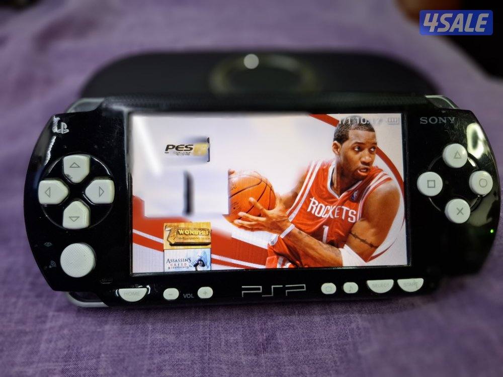 PSP SONY P1000 MODEL.BLACK& WHITE COLOR 8GB SD CARD 50GAMES3